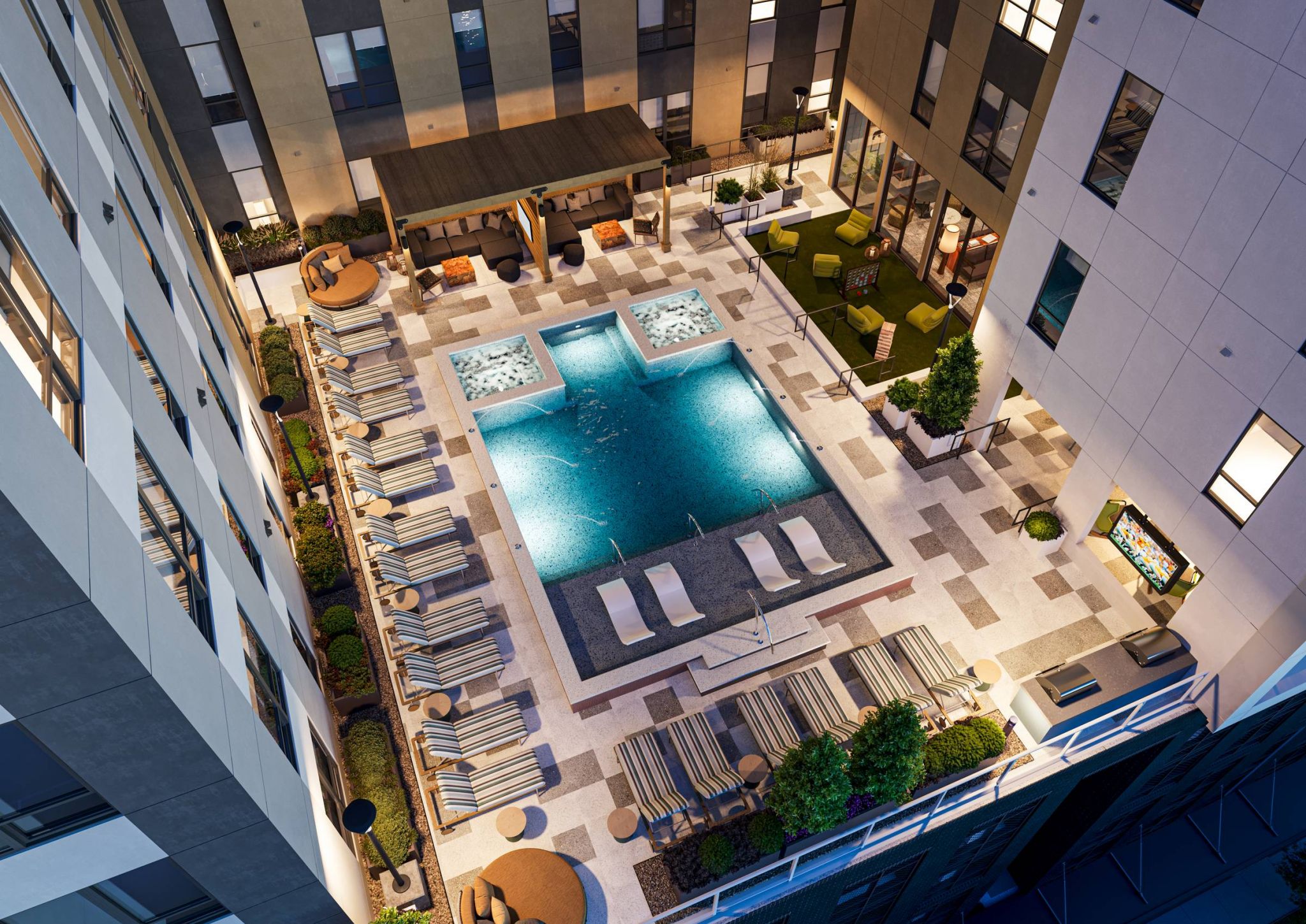 EVER Knoxville apartments aerial view of pool courtyard at night